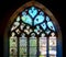 Old medieval colorful leaded-pane windows in gothic style