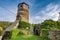 Old medieval round tower with hexagonal top