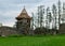 Old medieval stone castle ruins, castle tower with new roof structure, Ergeme castle ruins