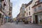 Old medieval street with half timbered houses in Colmar, France