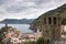 Old medieval watchtower and old houses on cliffs of Vernazza town at Cinque Terre national park, Italy