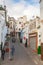 Old Medina area in Tangier, Morocco. Ordinary people are walking