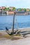 Old metal anchor on embankment in Stockholm