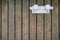 Old metal bollard is attached to a wooden jetty