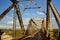 Old metal bridge over an African river