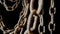 Old metal chain with rusted links on black isolated studio background. Rusty hanging aged chain in dust and dirt