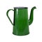 Old metal enameled tea coffee pot of green color isolate on a white background