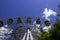 An old metal ferris wheel without people. Carousel, swings, amusement park