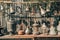 Old metal pots, copper jugs and samovar in antique shop close up