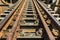 Old metal railway on steel train bridge