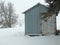 Old metal shed in snow