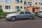 Old metalic grey big luxury sedan Volvo S90 parked