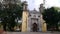 Old Mexican Church surrounded by trees in Coyoacan