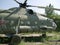 Old military abandoned helicopter. Broken non-working helicopter green