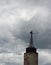 Old mill tower under the cloudy sky