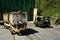 Old mine carts trolley on narrow gauge railway.