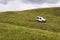 Old Mitsubishi Pajero stands on mountain road on 2 August 2016 in Livigno, Italy.