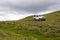 Old Mitsubishi Pajero stands on mountain road on 2 August 2016 in Livigno, Italy.