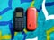 Old Mobile Phone with Texting or SMS Button Keyboard or Keypad on Colorful Carpet Background