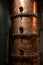 Old and modern equipment for distillation of strong alcoholic apple drink calvados in Normandy, Calvados region, France