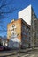 Old modernistic house with mural on and new block of flats in Gdynia, Poland.