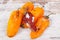 Old, moldy and wrinkled peppers. Unhealthy, decompose, spoiled vegetable