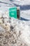 Old Monarch Pass Road sign covered in snow, Colorado