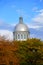 Old Montreal, Canada - October 25, 2019 - The view of the exterior dome of Bonsecours Market surrounded by striking colors of fall