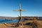 The old monument is a wooden cross and an old rusty anchor on a cliff at the extreme end of Tobizin cape in Vladivostok