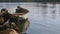 Old moored boat in a river, with trees on the other side