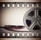 Old motion picture film reel with film strip