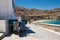 Old motor with trailer. View of the Greek beaches and bay.