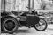 Old motorcycle in Santiago de Cuba, dark Motorbike with sidecar. Black and white photography