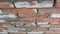 Old mottled brick wall angle view