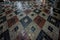 Old multicolor ceramic floor tiles