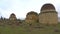 Old Muslim mausoleum of the complex of Eddie Gumbez, cloudy january day. Shamakhi, Azerbaijan