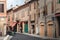 Old narrow street of the center of Ferrara, Italy