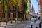 Old narrow street with tables of cafe in Ghent Gent, Belgium.