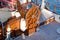 Old nostalgic sail boat - cockpit and rudder of teak wood.