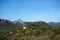 Old observation tower in middle of hilly landscape on Mallorca close to seaside