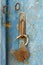 Old open padlock rusty on wooden weathered door