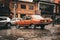 Old orange car on a rainy day in Bogota