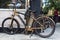 Old orange electric bicycle in New York City, USA