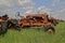 Old orange junked tractors