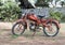 Old orange motorcycle at Masseria Il Frantoio, Southern Italy