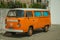 Old orange Volkswagen van perfectly preserved