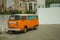 Old orange Volkswagen van perfectly preserved