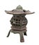 Old Oriental coal burning heater isolated.