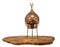 Old oriental incense burner made of copper stands on a wooden disc