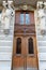 Old ornate door in Paris - typical old apartment buildiing.